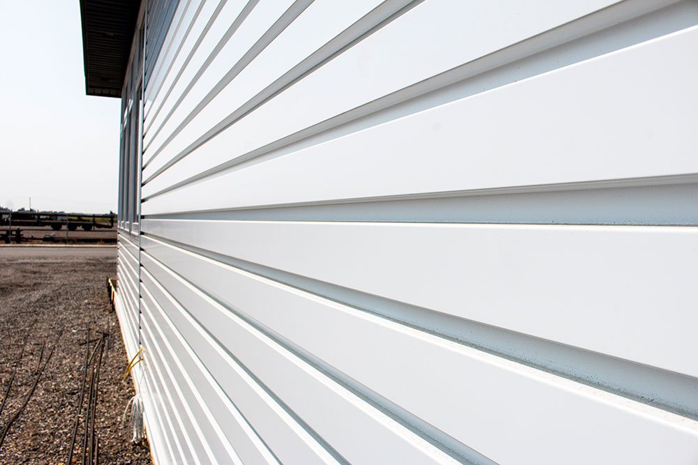 Commercial Office with Custom Panel Siding in Bright White