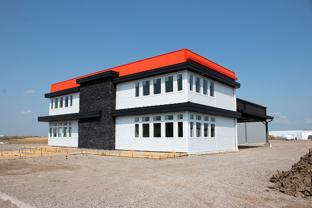 Commercial Office with Custom Panel Siding in Bright White