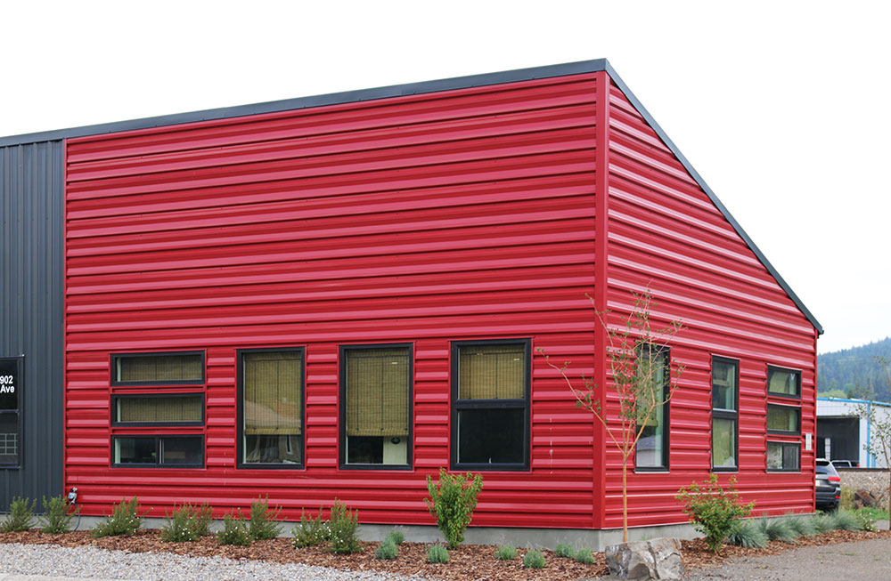 Commercial Distribution Centre featuring FA Panel Siding in Dark Red