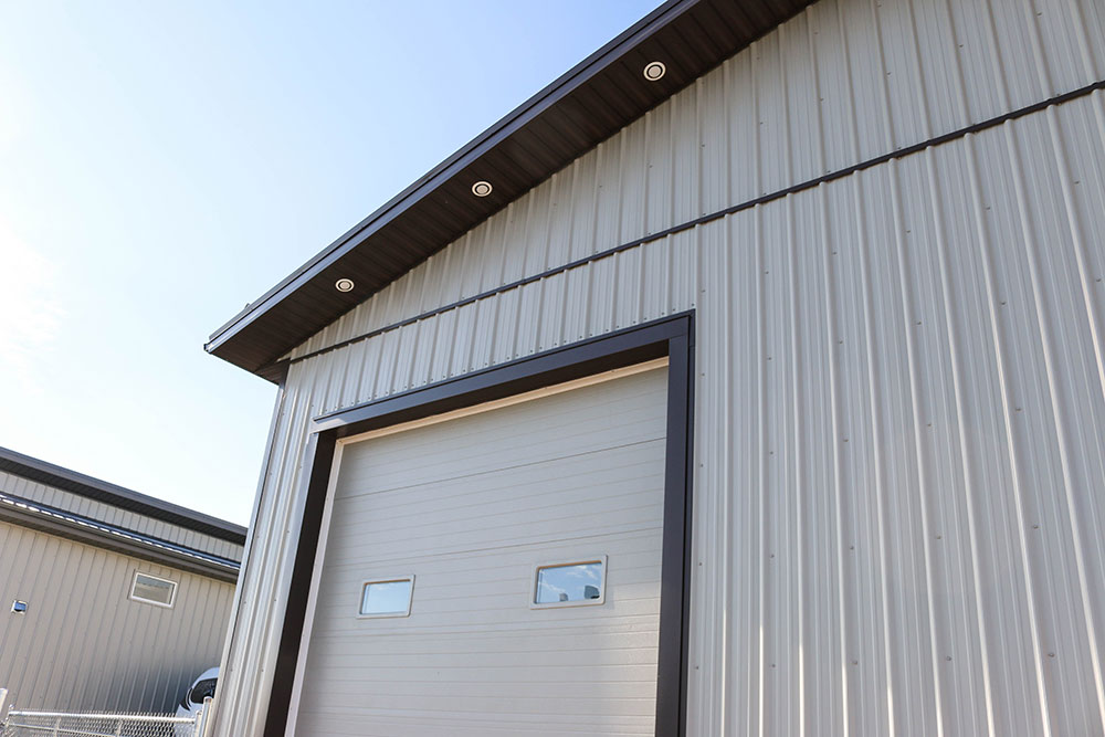 Commercial Shop featuring FC-36 Siding in Stone Grey and Dark Brown Trim & Soffit