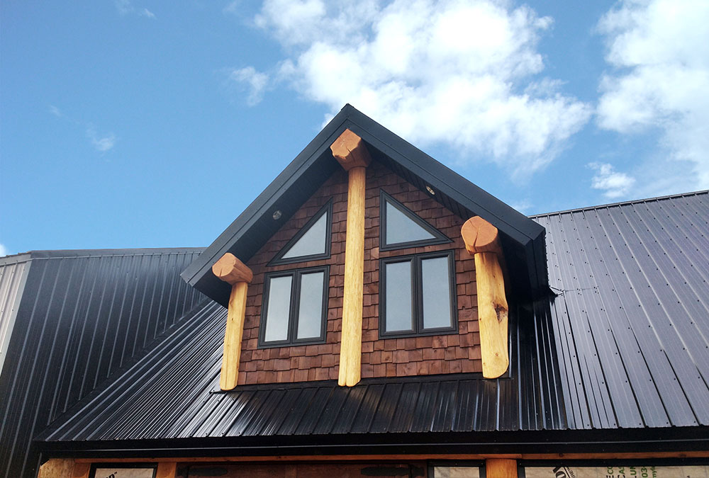 Residential Roof on Log Cabin featuring the FC-36 Panel in Black