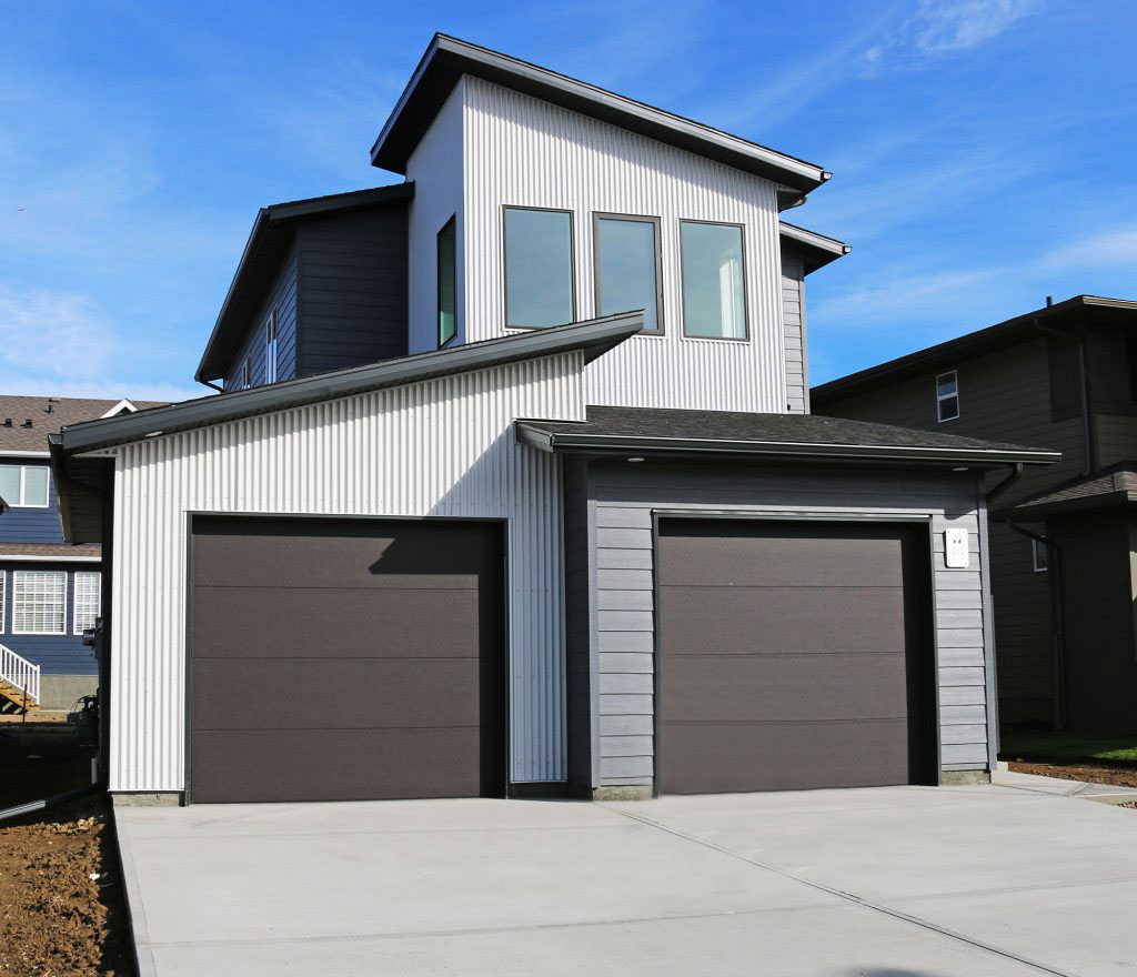 Residential Exterior featuring Bright White 7/8 Corrugated Accent Metal Siding by Forma Steela