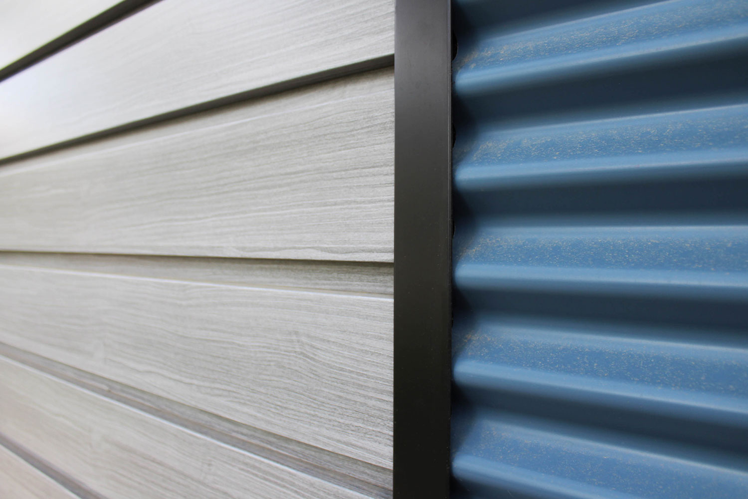 Residential Building with 7/8 Corrugated Oxford Blue Panel and Barnboard Woodgrain