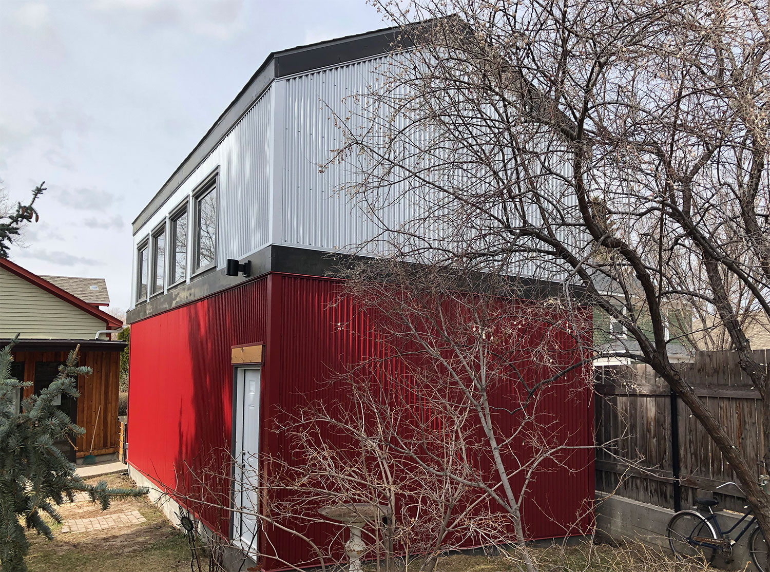 Residential Garage with Corrugated Galvalume and Dark Red