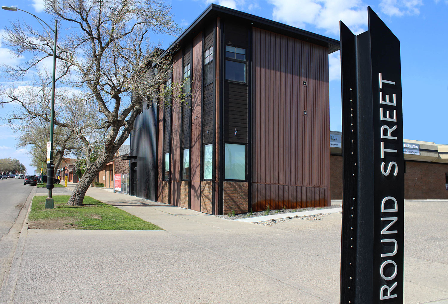 Residential Building with Custom Folded Weathering Steel Panel