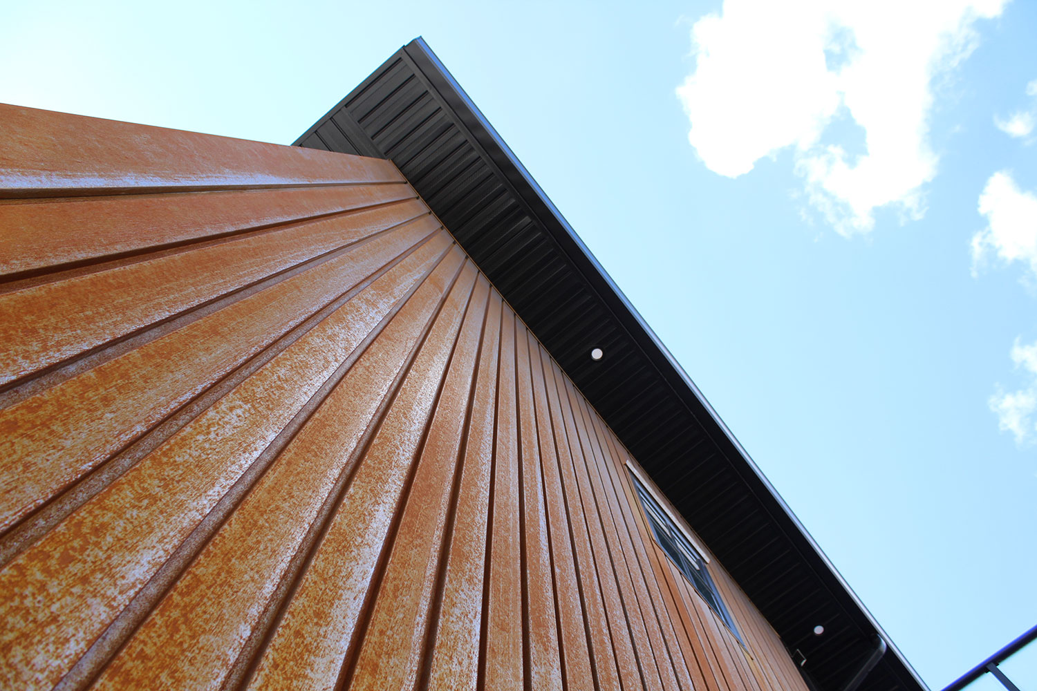 Residential Building with a Custom Folded Weathering Steel Panel