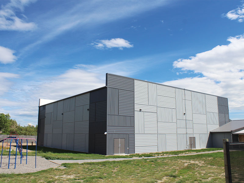 School Gymnasium with Carbon and Regent Grey in FC-36 Panel in grid pattern