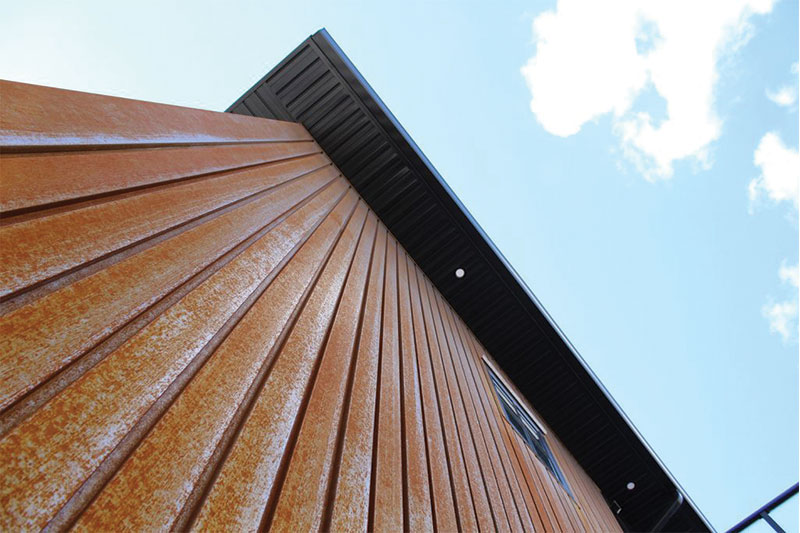 Residential Building with a Custom Folded Weathering Steel Panel