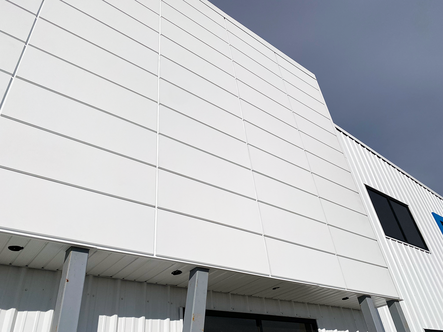 Commercial Building with Expand Panels in Textured Arctic White