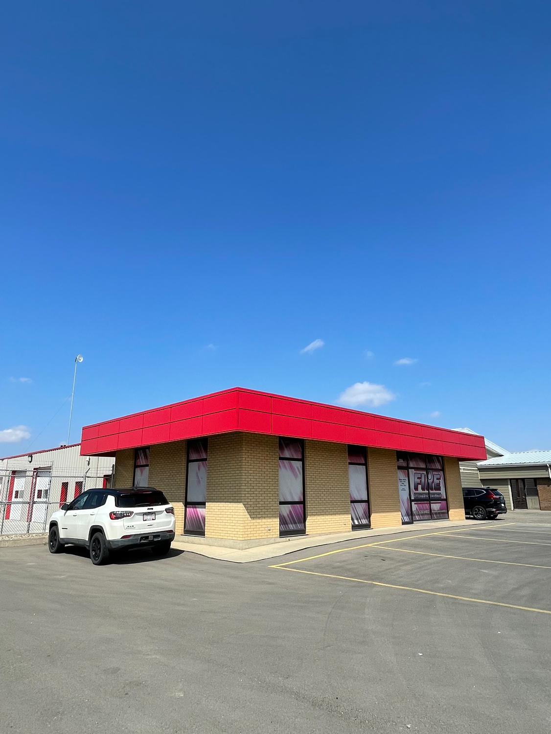 Commercial Building with Expand Modular Panels in Bright Red