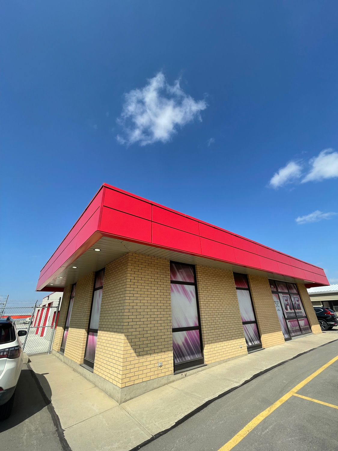 Commercial Building with Expand Modular Panels in Bright Red