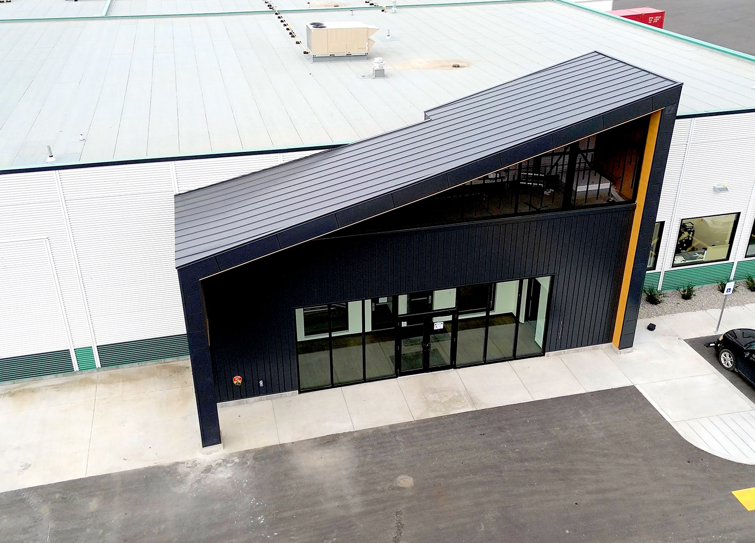 Commercial Building with Expand Modular Panels in Carbon and Interloc 8" in Autumn.