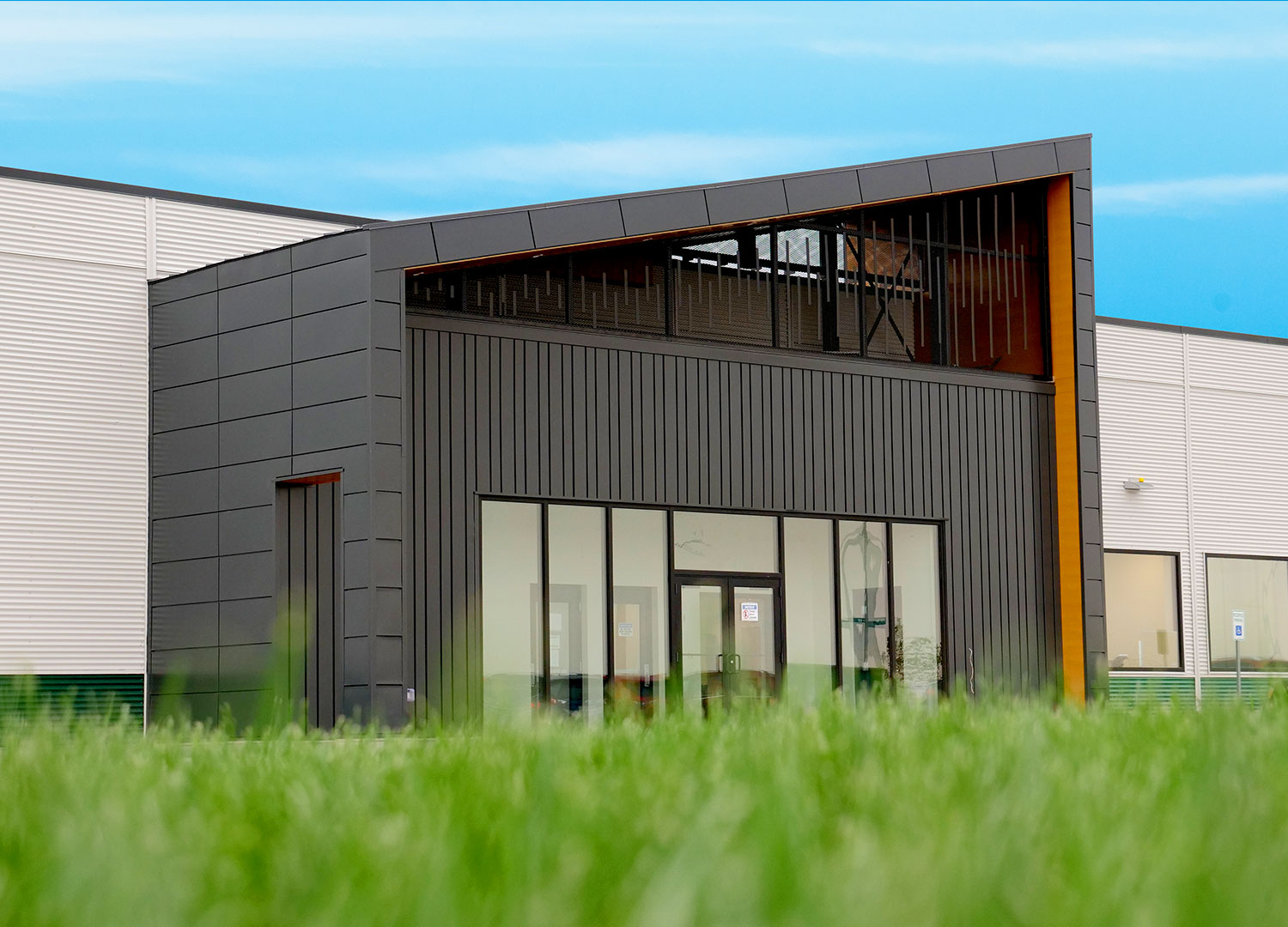Commercial Building with Expand Modular Panels in Carbon and Interloc 8" in Autumn.