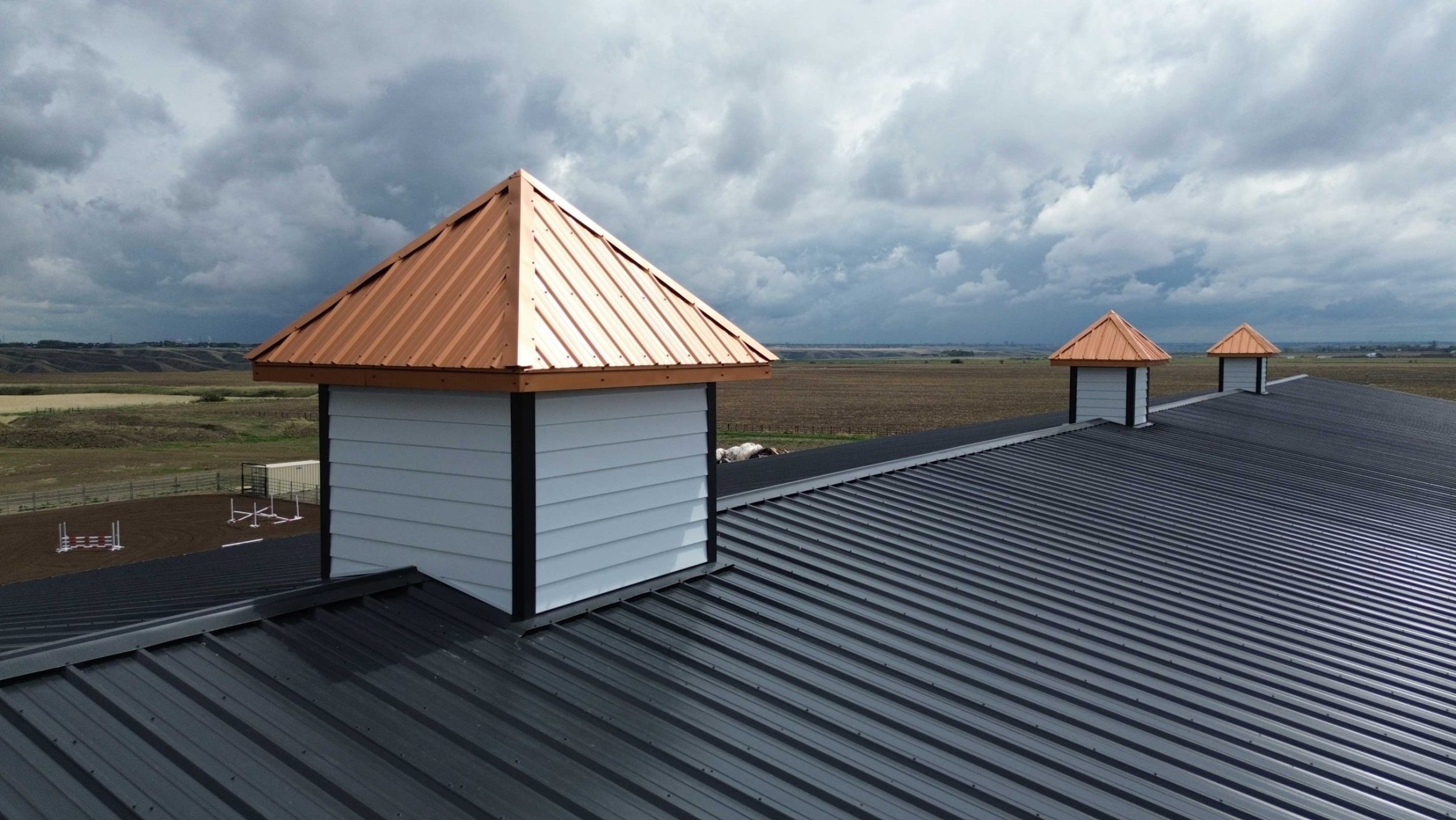 ShipLap in Bright White with FC-36 Copper Penny Cupolas and FC-36 Roof in Carbon