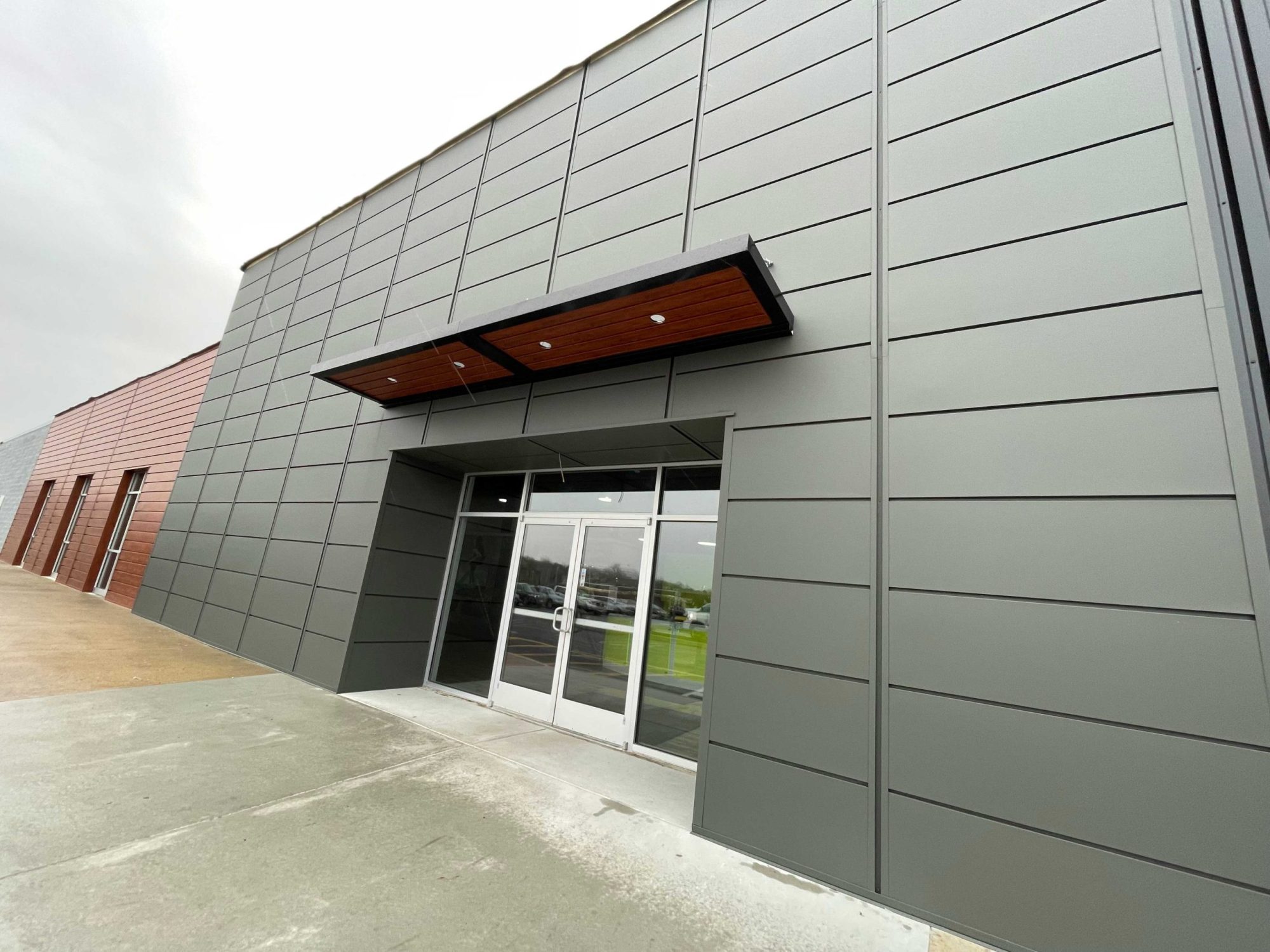 Expand Modular Panels in Graphite and Forma Plank in Gunstock Woodgrain