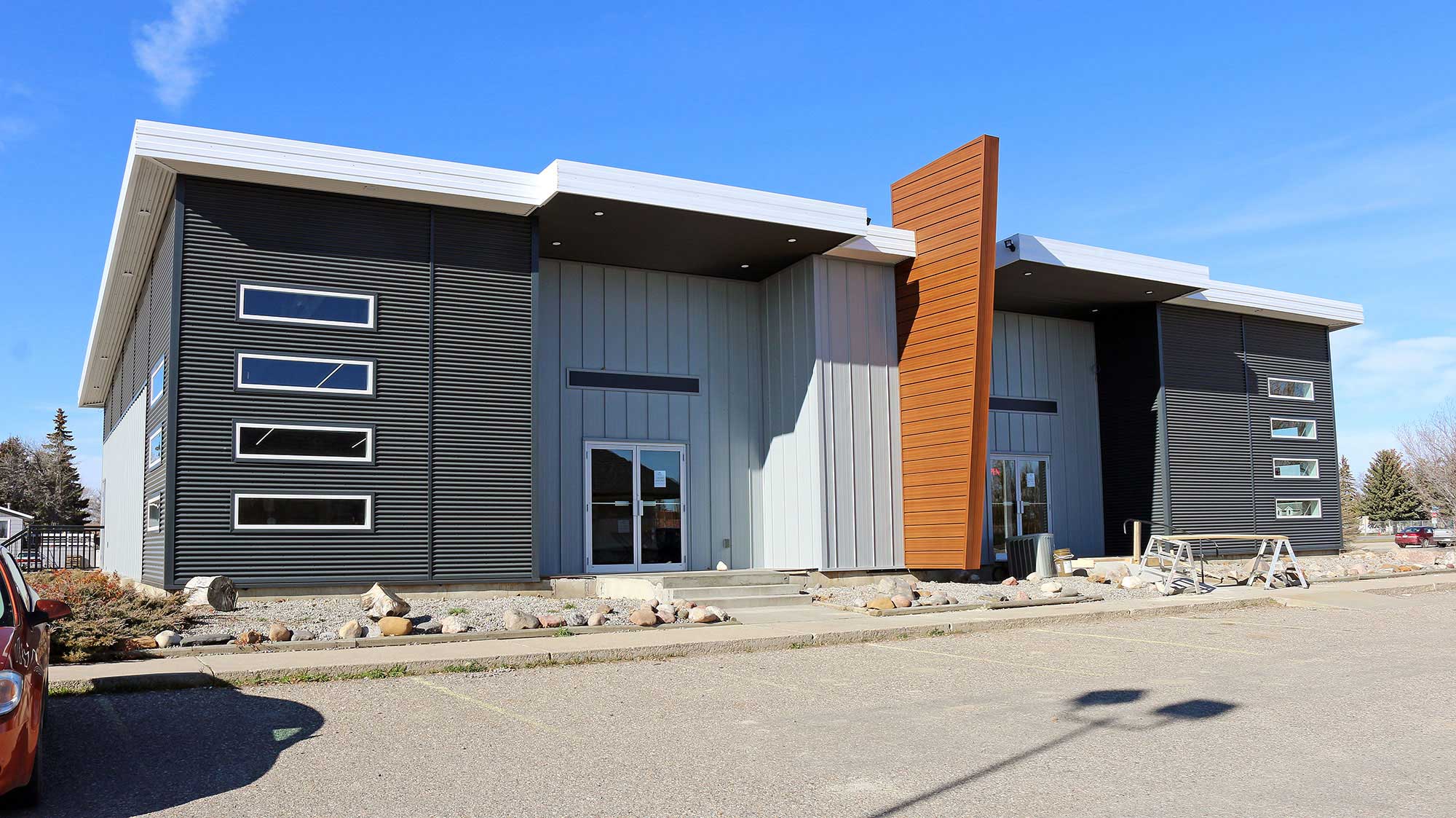 FormaLoc in Regent Grey, Forma Plank in Espresso Woodgrain, and 7/8" Corrugated in Carbon