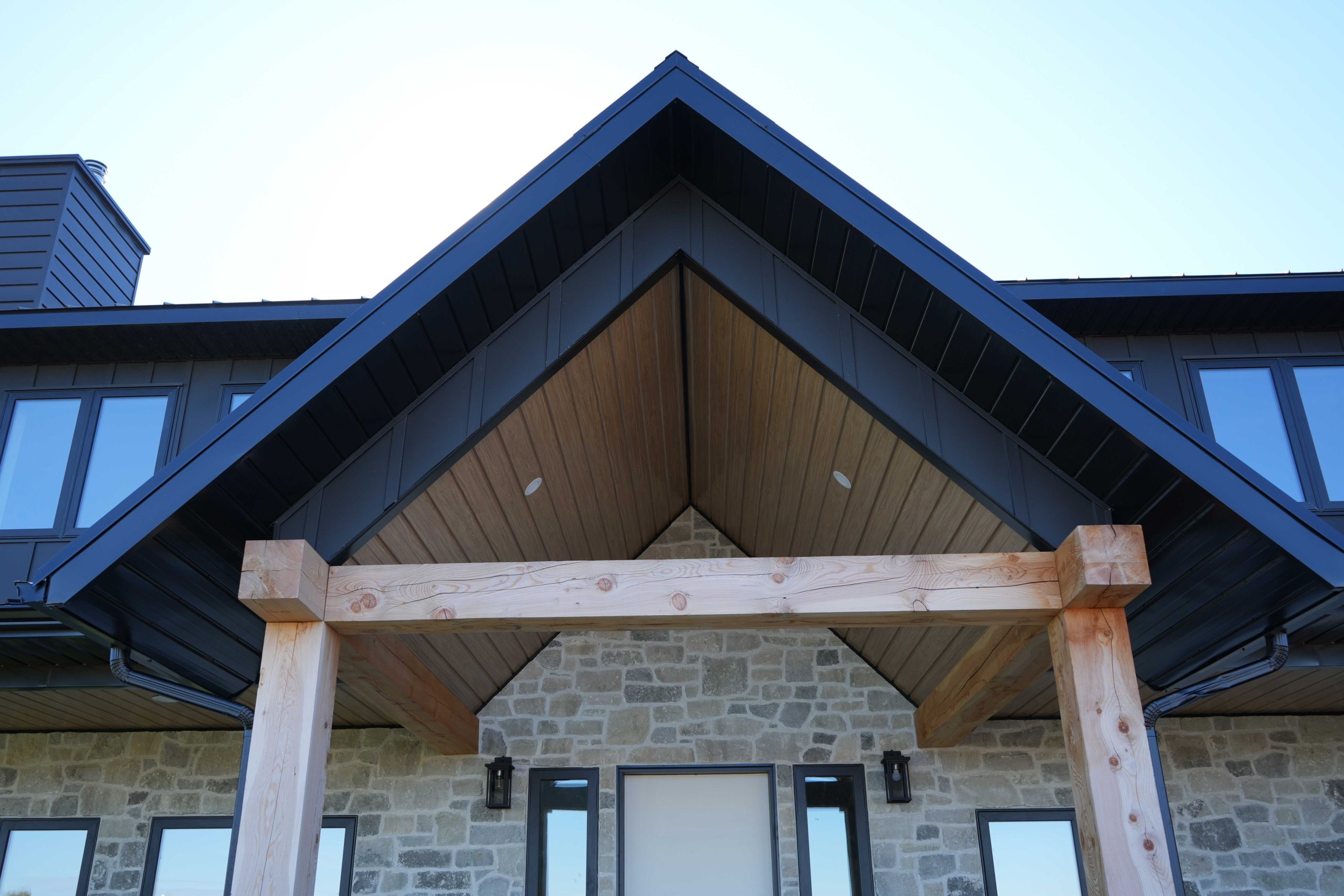 II/6 Reverse Soffit in Light Pine Woodgrain and Board and Batten in Textured Onyx Black II/6 Reverse Soffit in Light Pine Woodgrain and Board and Batten in Textured Onyx Black